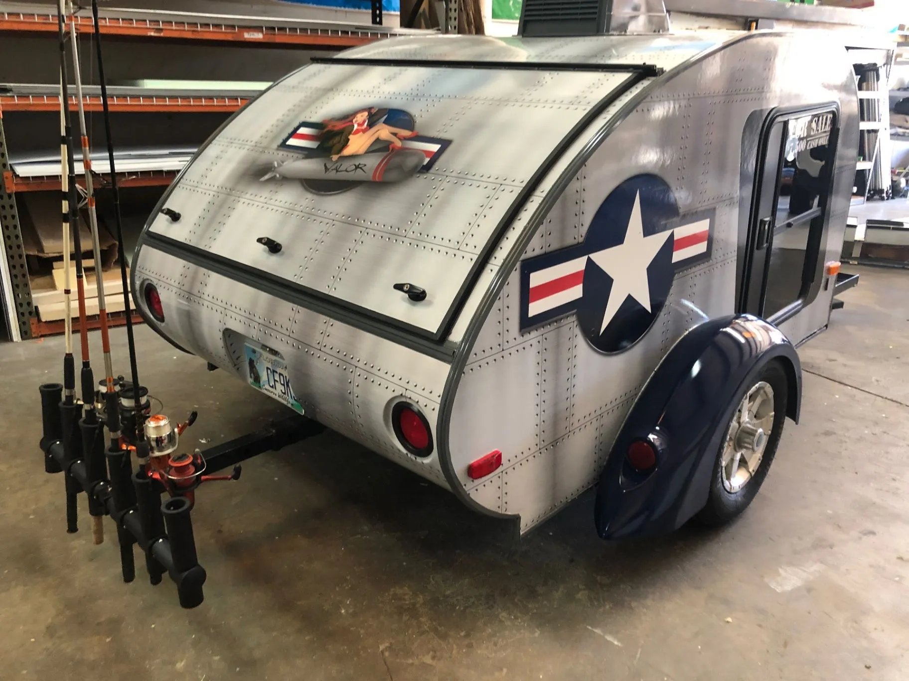 Custom military-inspired teardrop trailer with FISHITCH product integration